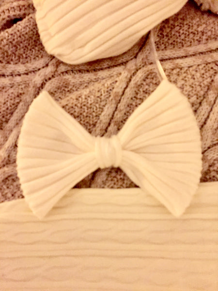 white sweater hairbow