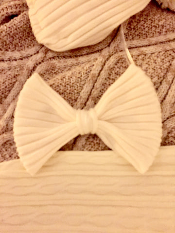 white sweater hairbow